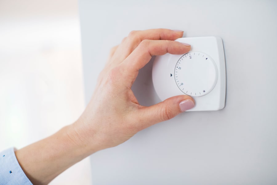 Adjusting the thermostat on climate controlled storage at 603 Storage in Pittsfield, New Hampshire