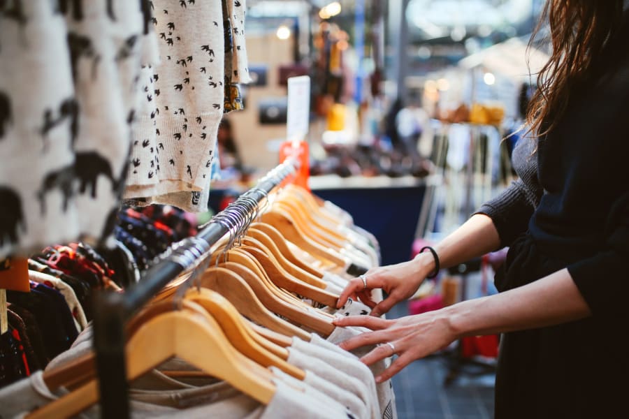 Resident shopping at a clothing boutique near Terra Martinez in Martinez, California