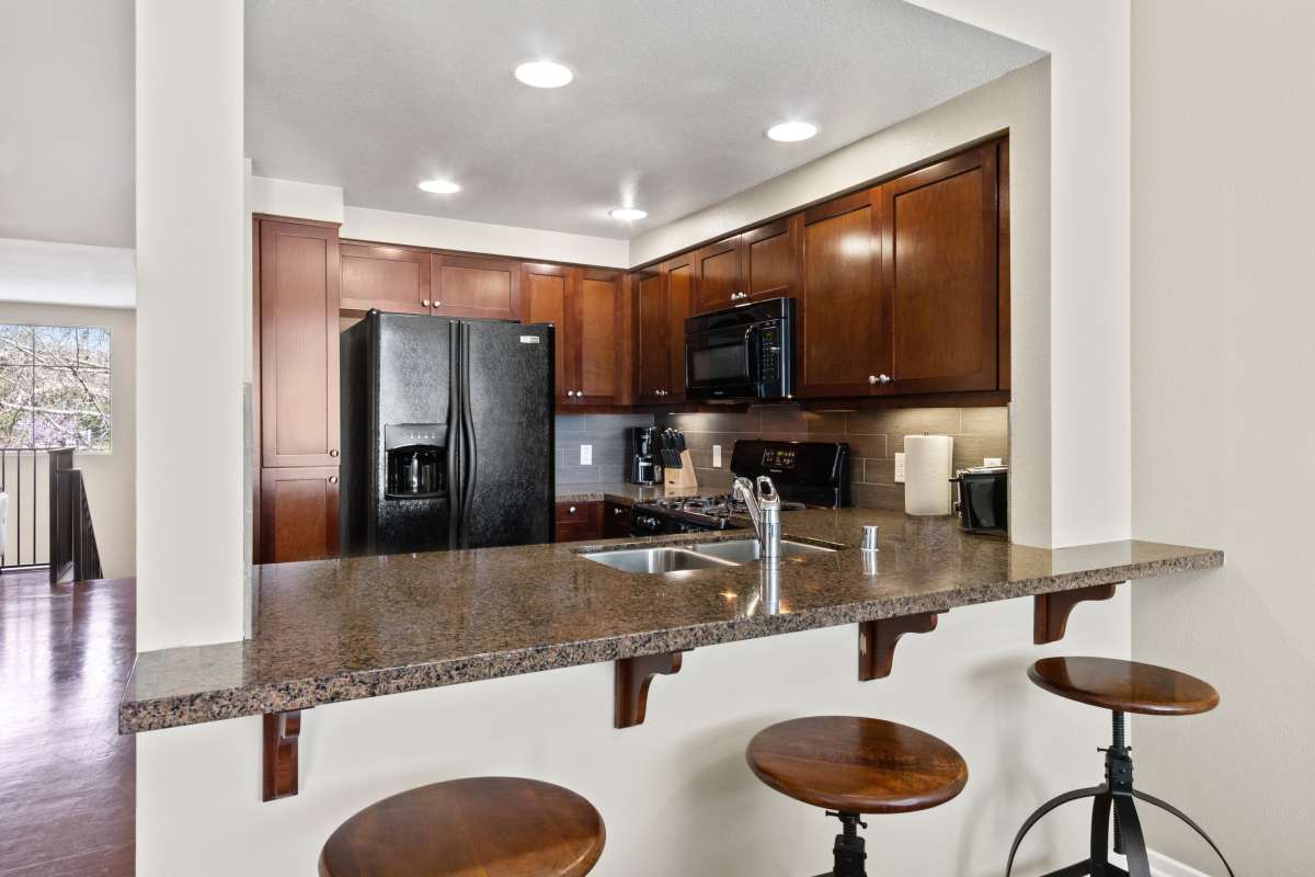 Modern kitchen at Ontario Town Square Townhomes in Ontario, California