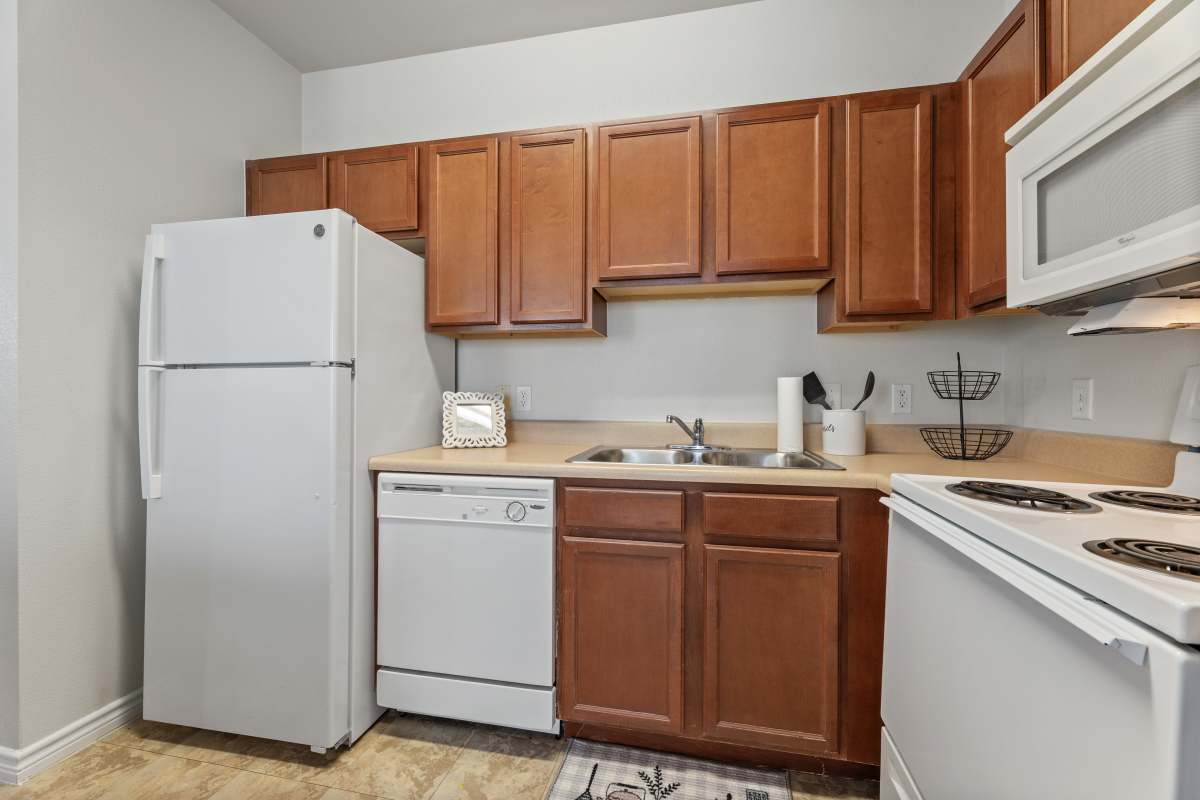 Kitchen with dishwasher at Costa Ibiza in Houston, Texas  