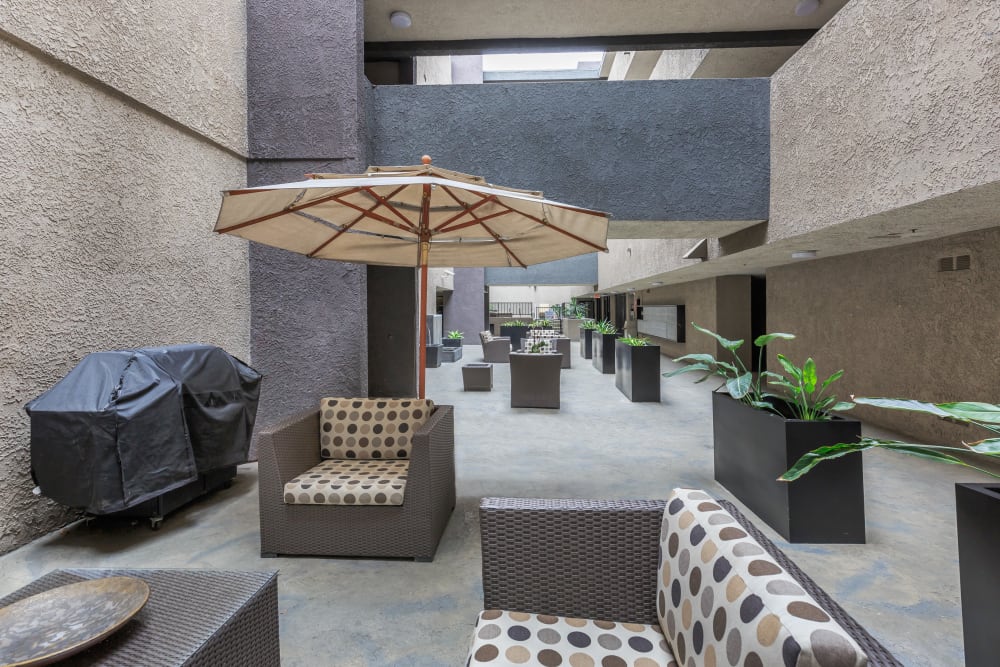 Seating area outside of Club Marina Apartments in Los Angeles, California