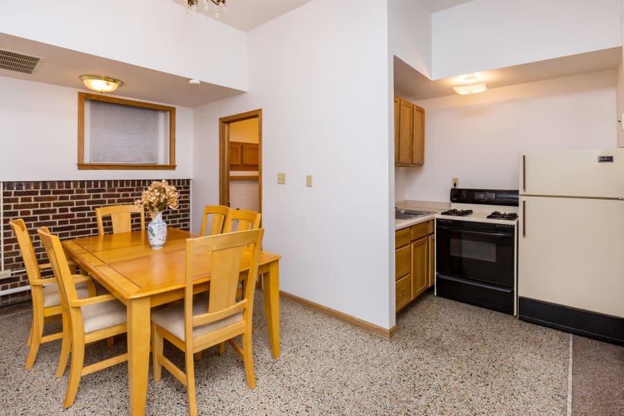 Cozy dining room and kitchen at Concord & Castle in Des Moines, Iowa