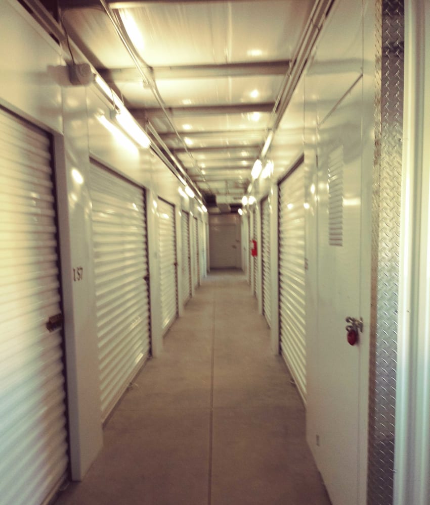 White doors on indoor units at American Self Storage – High Point Greensboro Rd in High Point, North Carolina