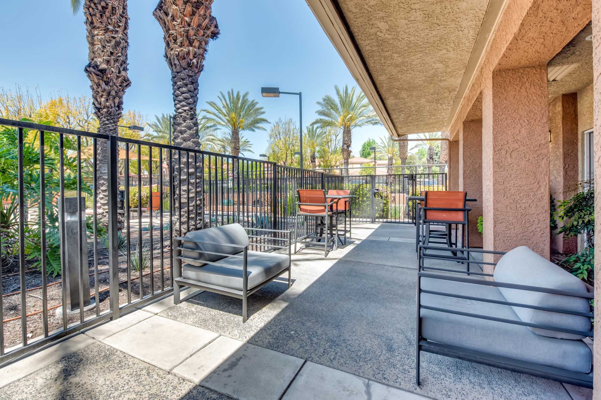 Outdoor wi-fi lounge area at Tuscany Village Apartments in Ontario, California