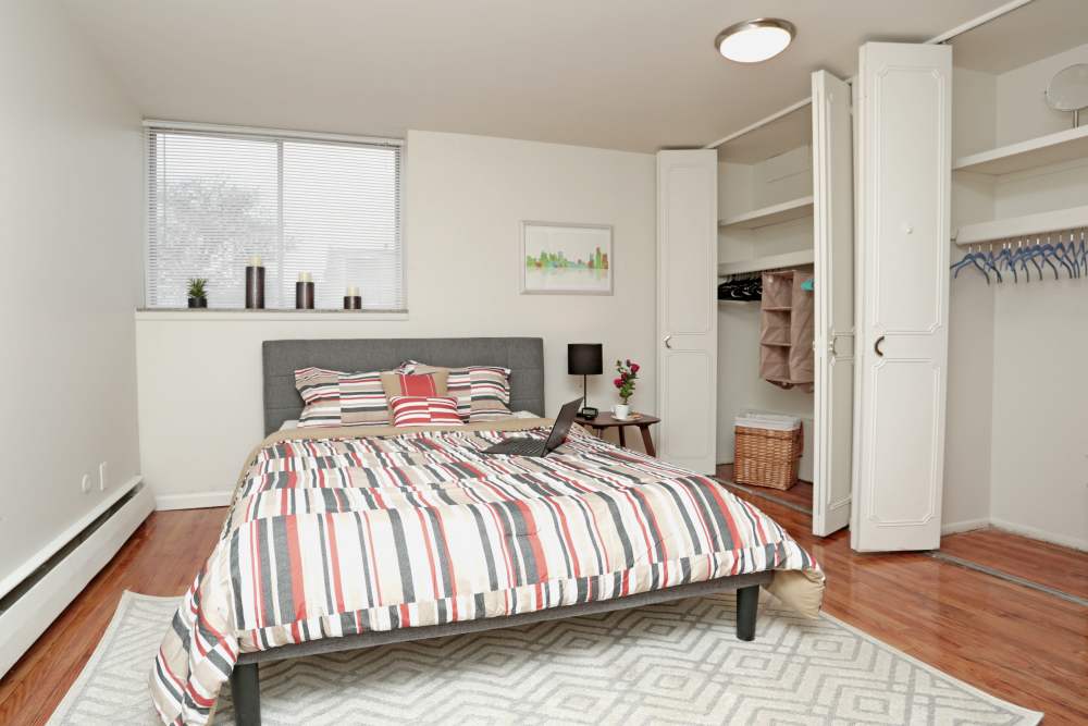 Bedroom with closet at Detroit Living in Detroit, Michigan