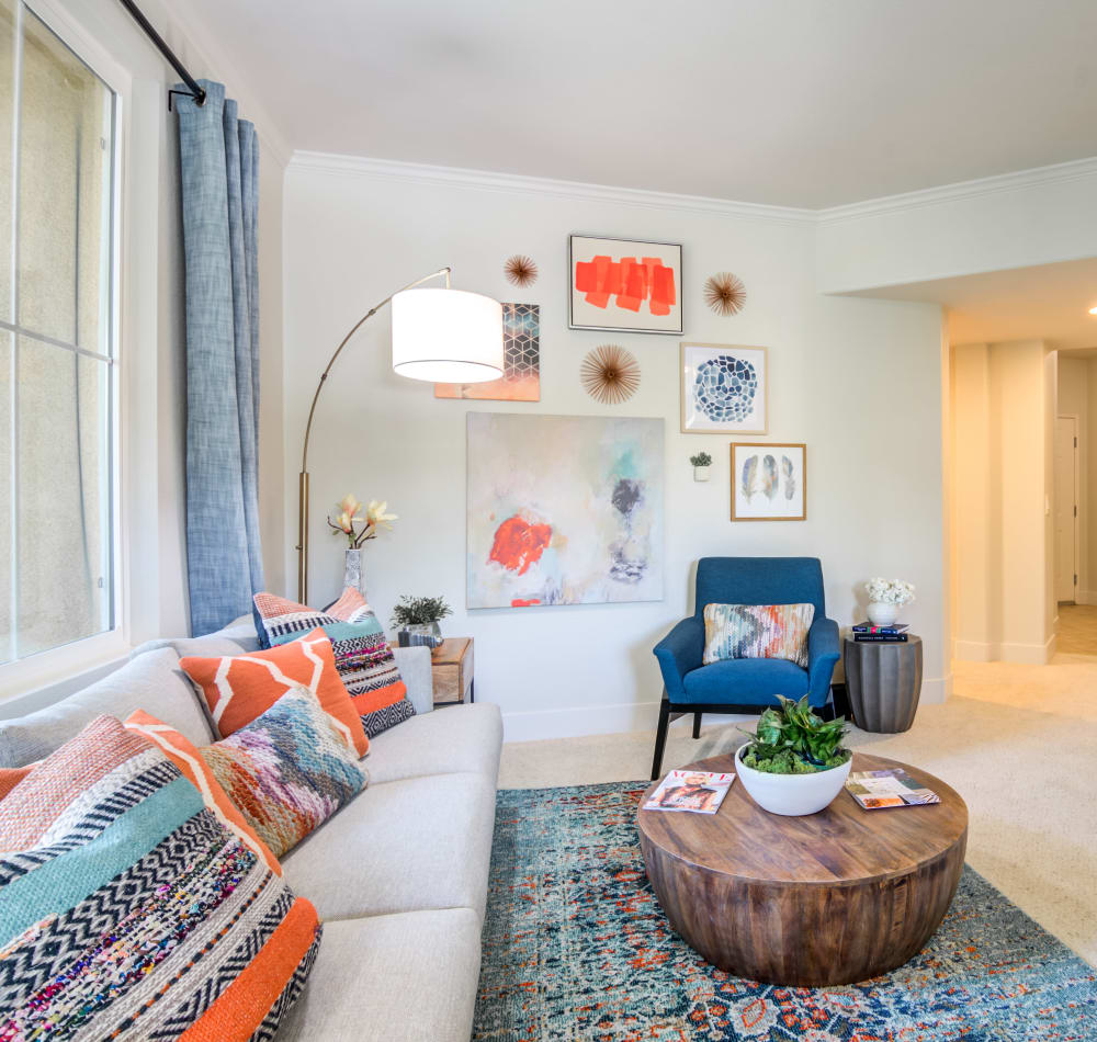 Living room with a large window at Sofi Shadowridge in Vista, California