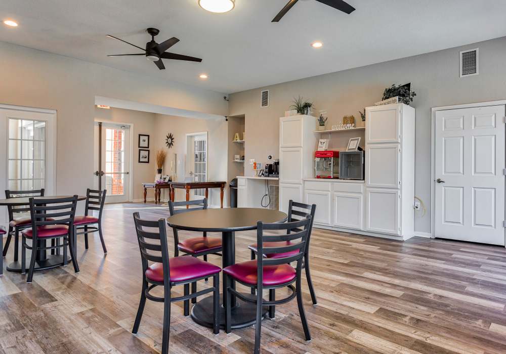 Resident playing with her dog at Autumn Brook Apartments in Chickasha, Oklahoma