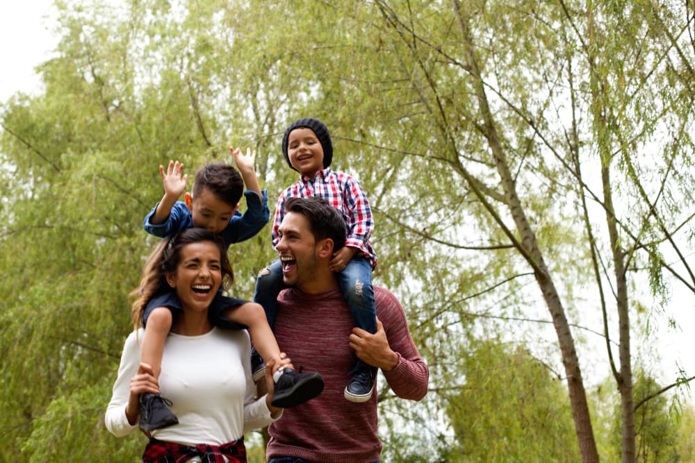 A family out for a walk near Shadow Ridge Apartments in Oceanside, California