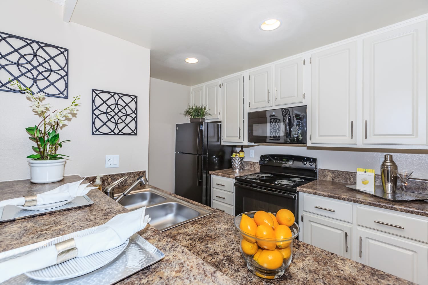 Kitchen at Parcwood Apartments in Corona, California