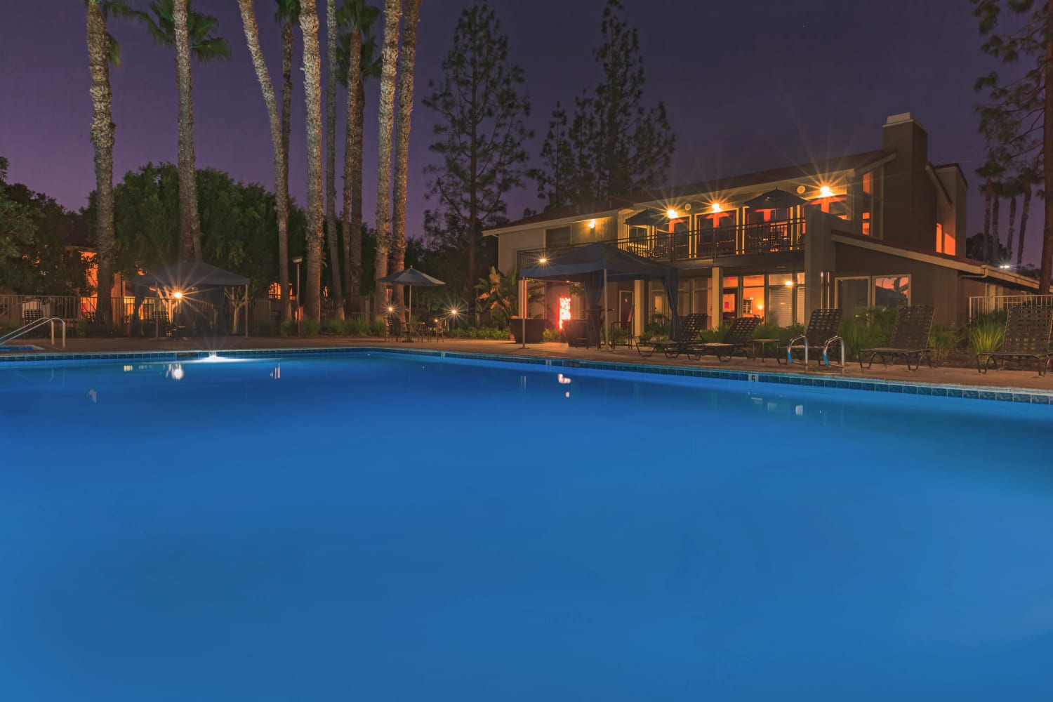 Enjoy a large swimming pool Parcwood Apartments in Corona, California