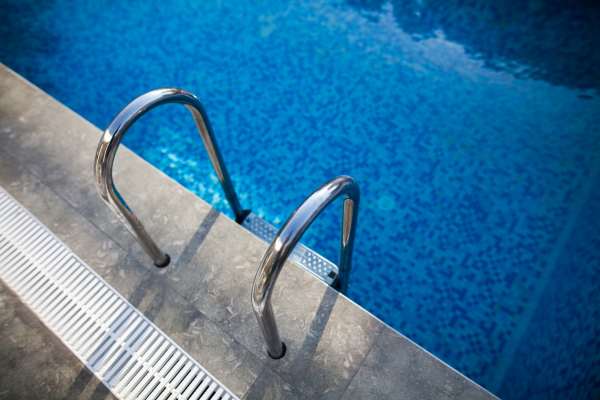 A ladder into the community pool at Valley Park Apartments in West Valley City, Utah