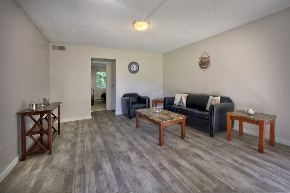 Spacious living room at Fair Oaks Apartments in Sacramento,California