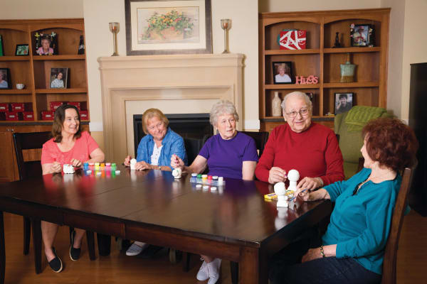 Residents enjoying an activity at The Enclave at Round Rock Senior Living in Round Rock, Texas