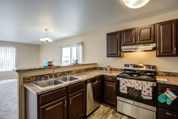 A view of the kitchen at Belle Creek Apartments in Henderson, CO