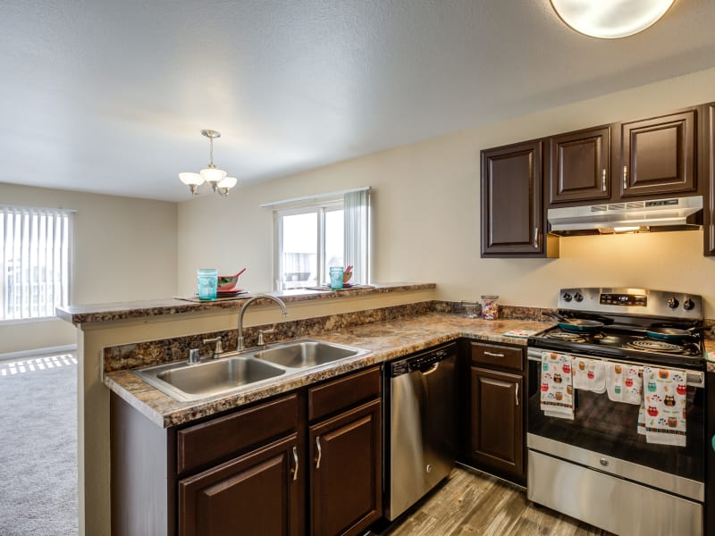 Modern kitchen at Belle Creek Apartments in Henderson, CO
