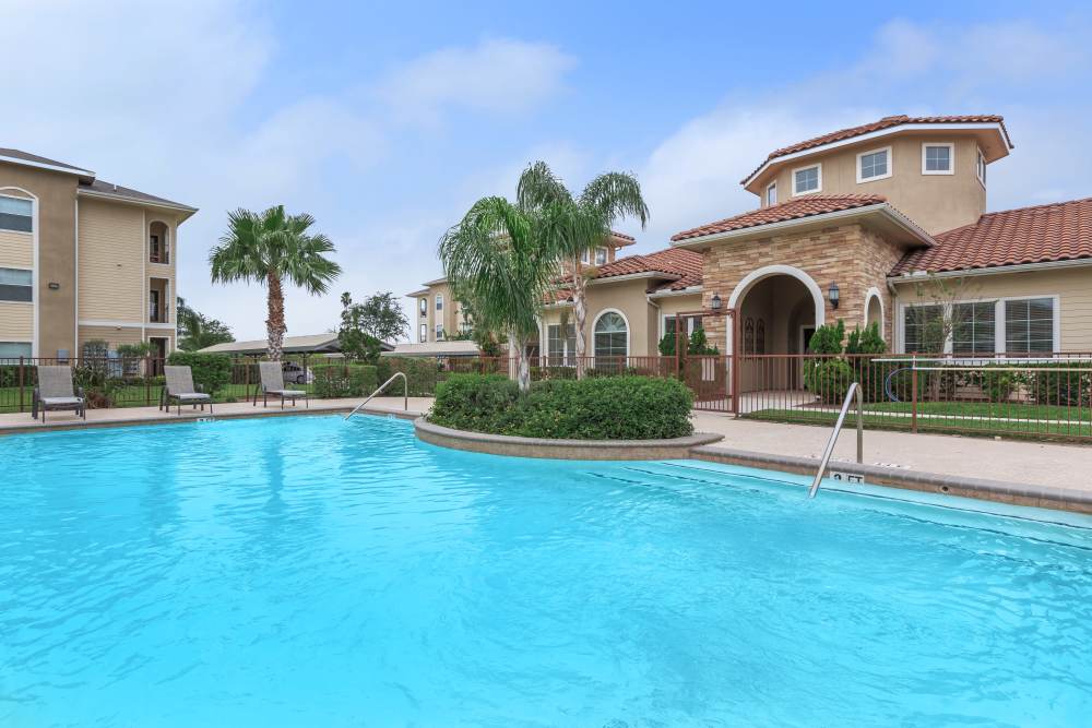 The sparkling community swimming pool at Weslaco Hills Apartments in Weslaco, Texas