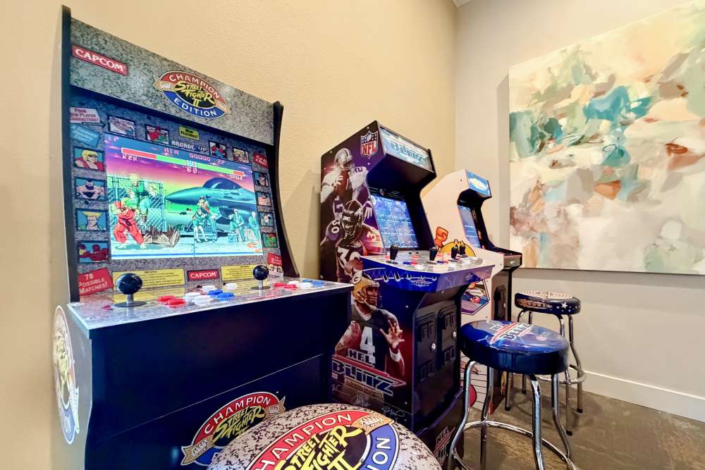 Resident clubhouse with arcade games at Hawthorn Village Apartments in Napa, California