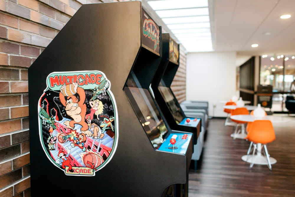 Arcade cabinets in the resident game room at MOD Apartments in Seattle, Washington
