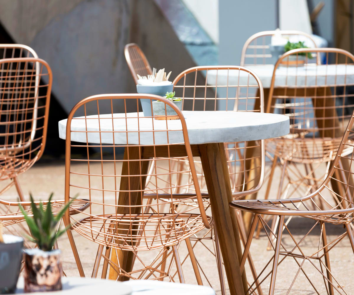 Outdoor seating at Watercress Apartments in Maize, Kansas