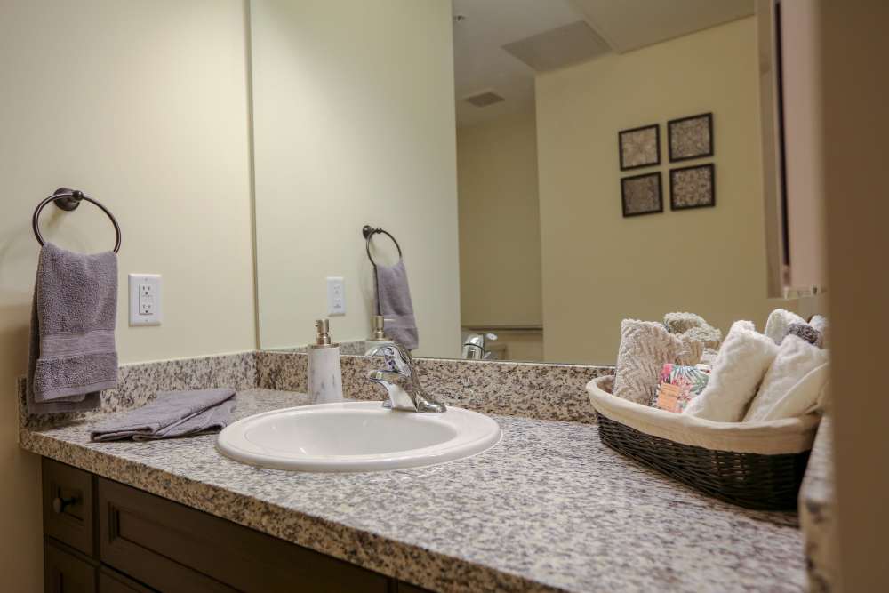 Bathroom with a waterfall sink at Harmony at Bellevue in Nashville, Tennessee