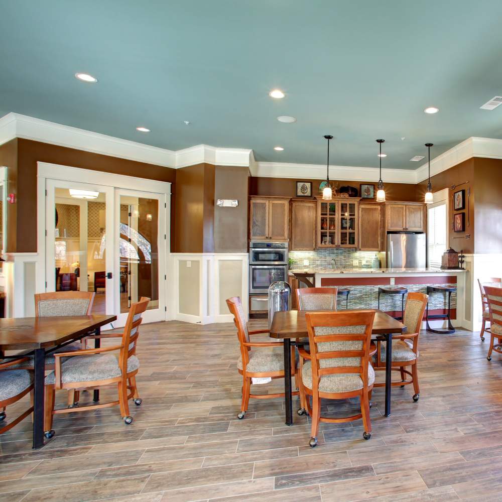Cozy dining area with modern kitchen accents at Avonlea Square in Smyrna, Georgia.