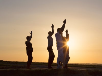 Residents doing yoga outdoors near Element Oakwood in Dayton, Ohio