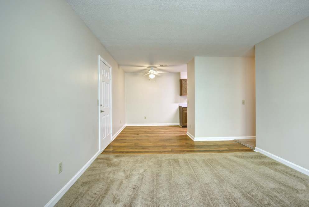 Unfurnished living room with view to dining and kitchen at Ridgewood at Greenbrier in Greenbrier, Tennessee