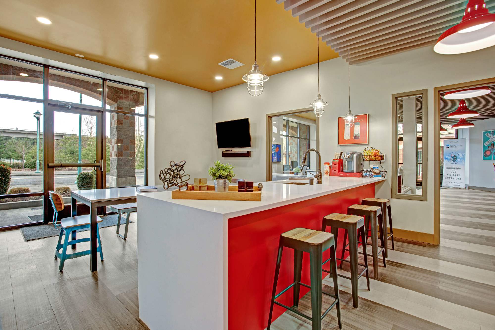 Clubhouse kitchen with barstool at Trax at Dupont Station in Dupont, Washington