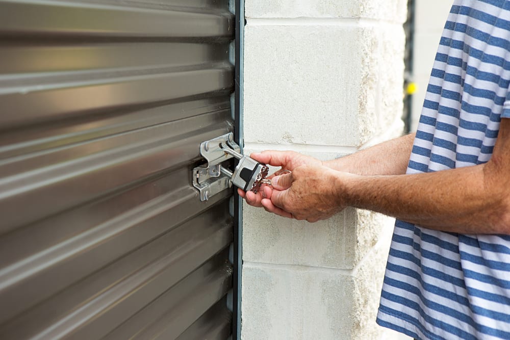 Locking up a unit at Urban Smart Storage - Lynden in Lynden, Washington.