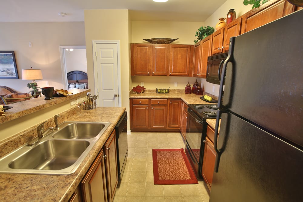 Spacious kitchen overlooking the living room in a model home at The Heights at McArthur Park in Fayetteville, North Carolina