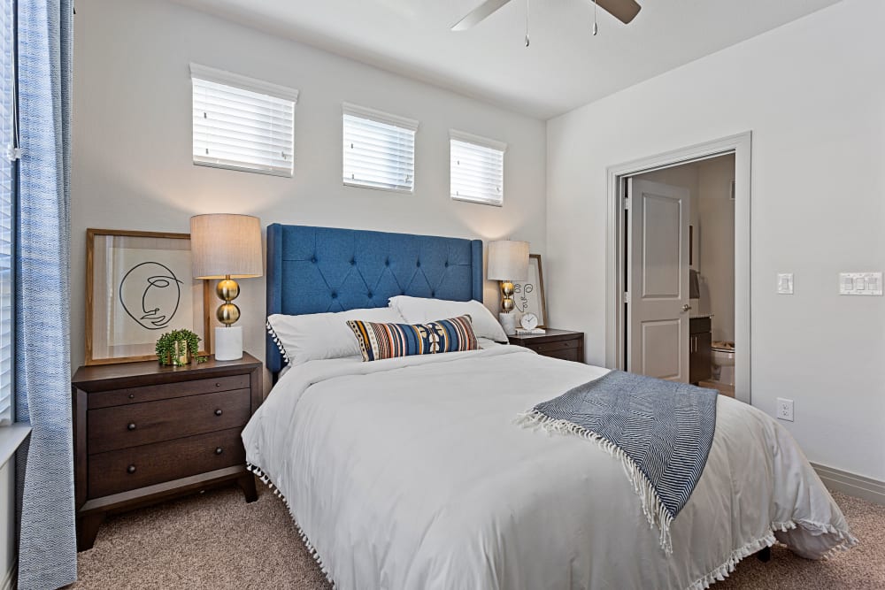 Cozy model bedroom at Olympus Hudson Oaks in Hudson Oaks, Texas