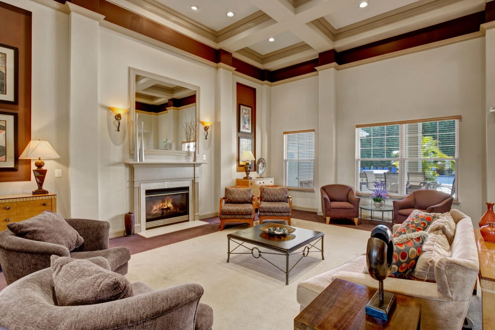 Cozy clubhouse with fireplace at Windsor Commons Apartments in Baltimore, Maryland
