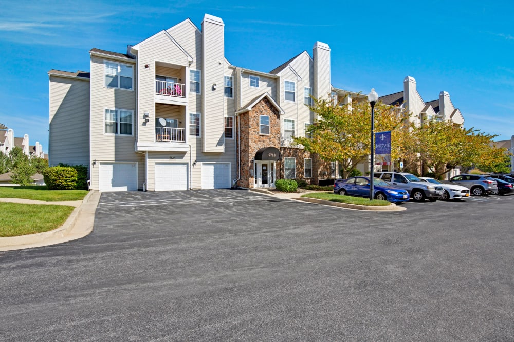 Exterior with garages at Windsor Commons Apartments in Baltimore, Maryland