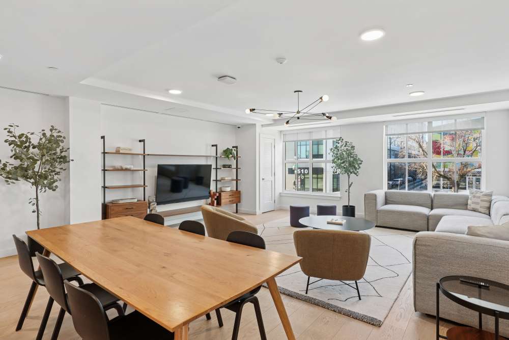 Clubhouse with dining table and chair at Mily on Green in Philadelphia, Pennsylvania