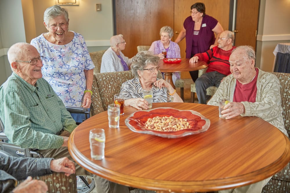 Residents sitting in comfortable lounge area at Shorewood Senior Living in Florence, Oregon