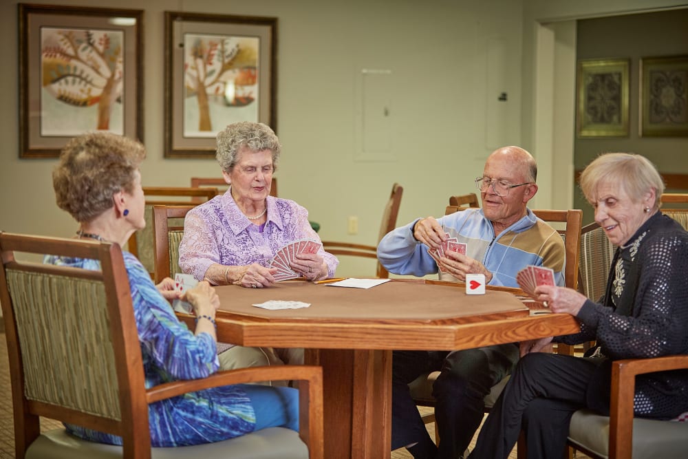 Residents hanging out and playing games at Shorewood Senior Living in Florence, Oregon