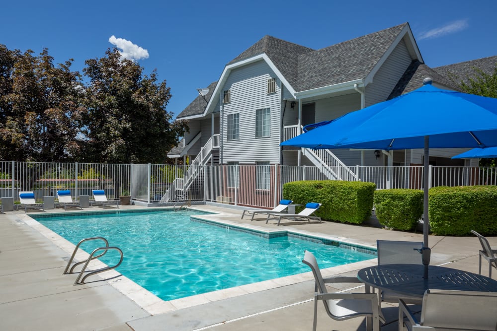 Beautiful resort-style swimming pool at Windgate Apartments in Bountiful, Utah