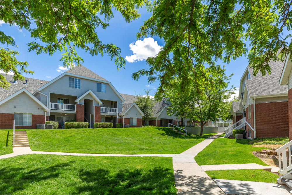 Enjoy the lush landscaping at Windgate Apartments in Bountiful, Utah