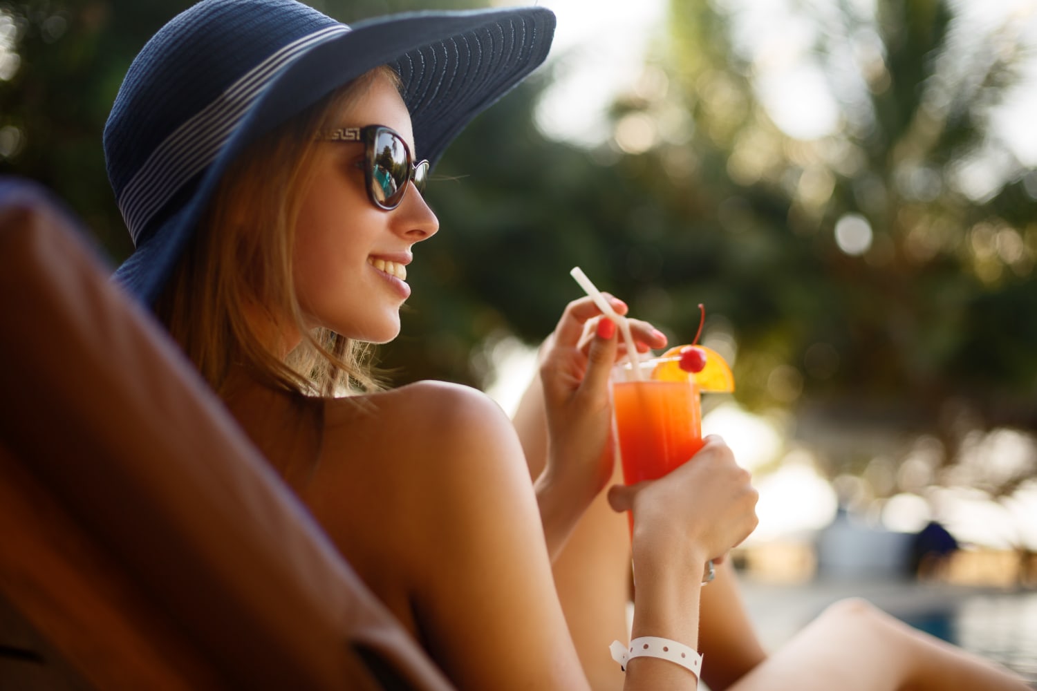 Women enjoying a poolside drink at The Bluffs in Rancho Cucamonga, California