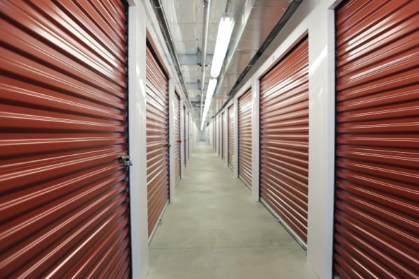 Interior units with red doors at Clover Basin Self-Storage in Longmont, Colorado