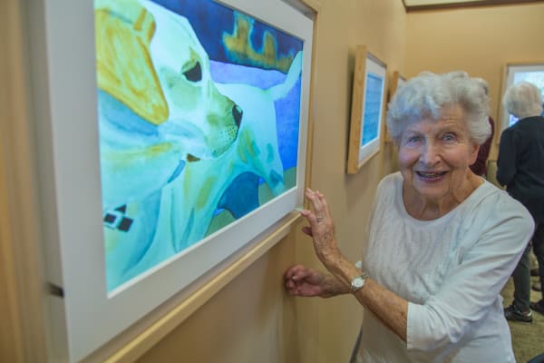 Seniors living a happy life here at Merrill Gardens at Huntington Beach