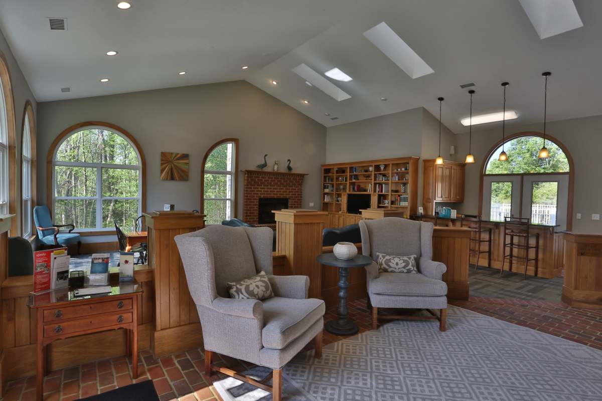 Residents playing chess in the clubhouse at Chickahominy Bluff in Mechanicsville, Virginia