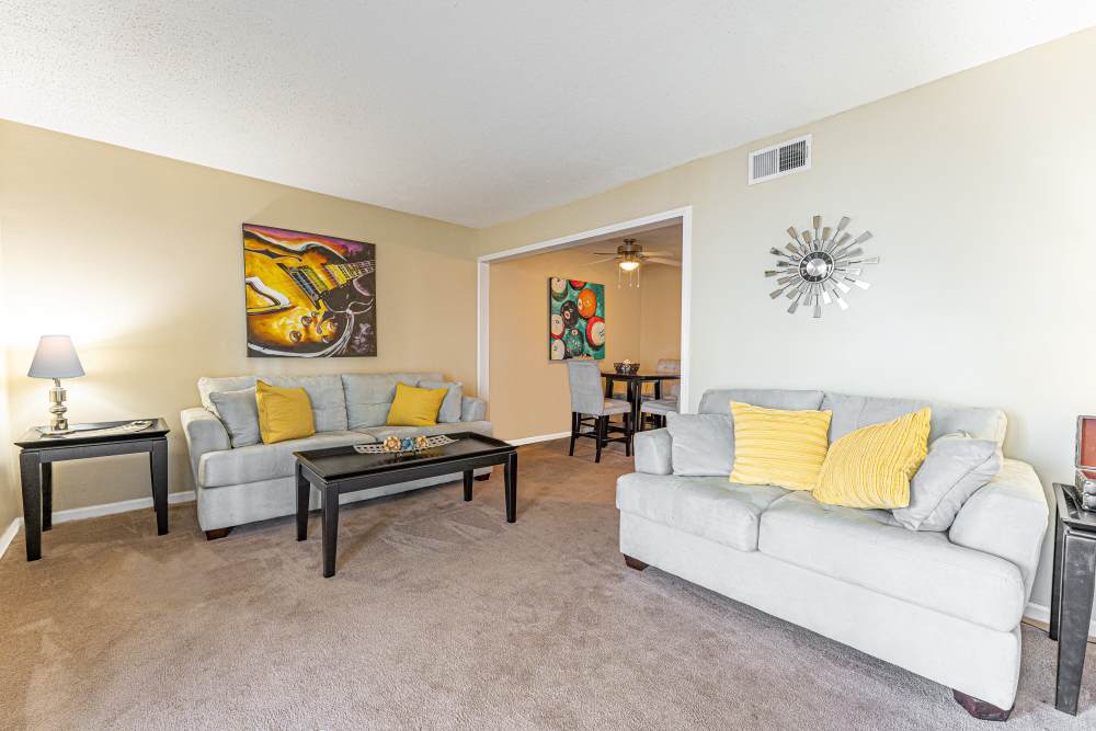 Living room with couch and coffee table at Tiger Village in Columbia, Missouri