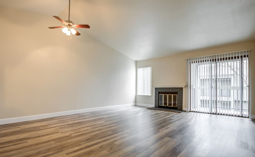Bright and spacious living room at Waterfield Square Apartment Homes in Stockton, CA