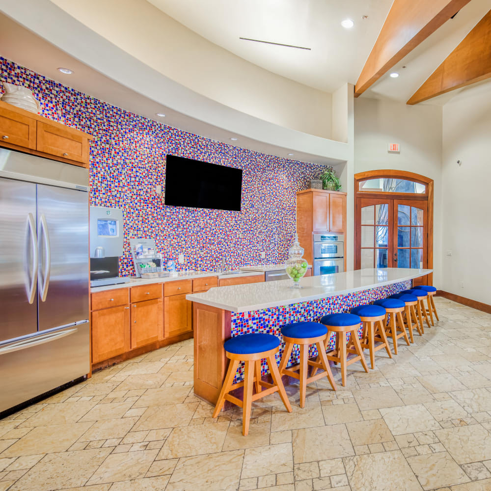 Kitchen in common area of Portico at West 8 Apartments in Houston, Texas