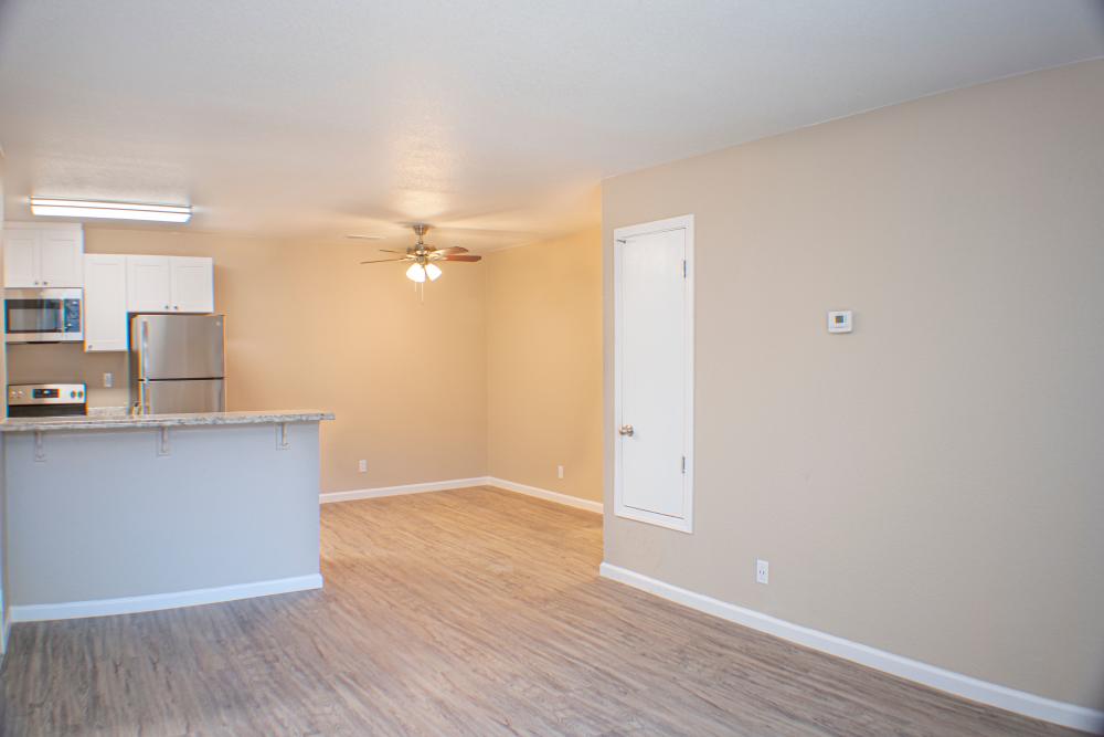 Unfurnished living room with kitchen view at Lakeview in Reno, Nevada