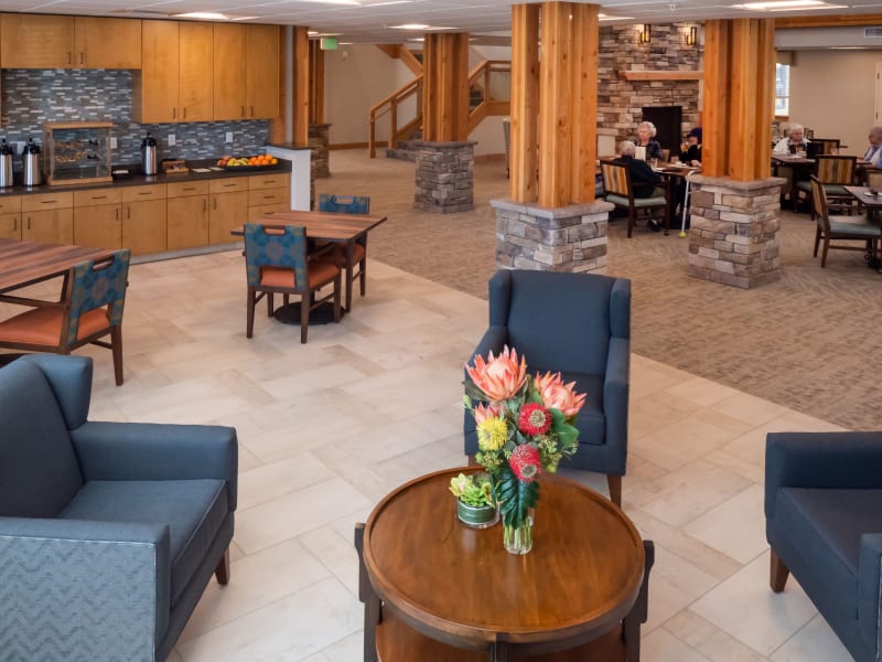 Comfortable communal lounge area with complimentary coffee and tea at Pear Valley Senior Living in Central Point, Oregon