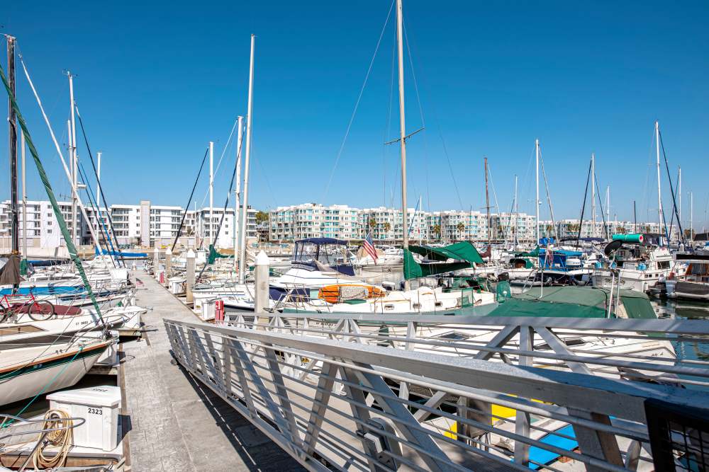 Boats parked at Harborside Marina Bay Apartments in Marina del Rey, California