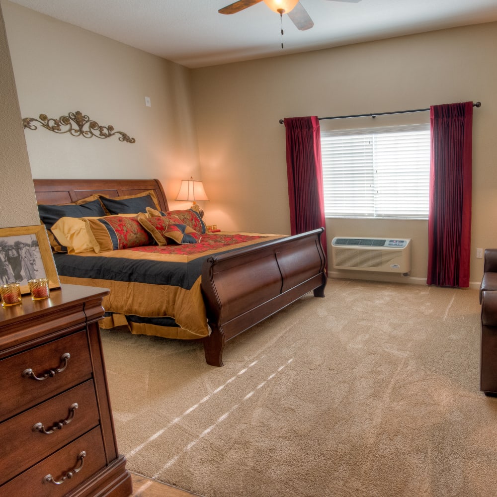 Large resident bedroom at Inspired Living Ocoee in Ocoee, Florida.