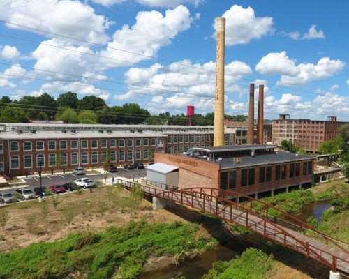 Exterior view of the building at Revolution Mill in Greensboro, North Carolina